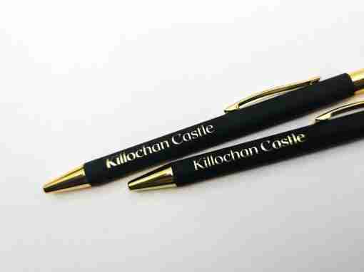 Killochan Castle Pens Two black pens with gold accents featuring the text 'Killochan Castle'.